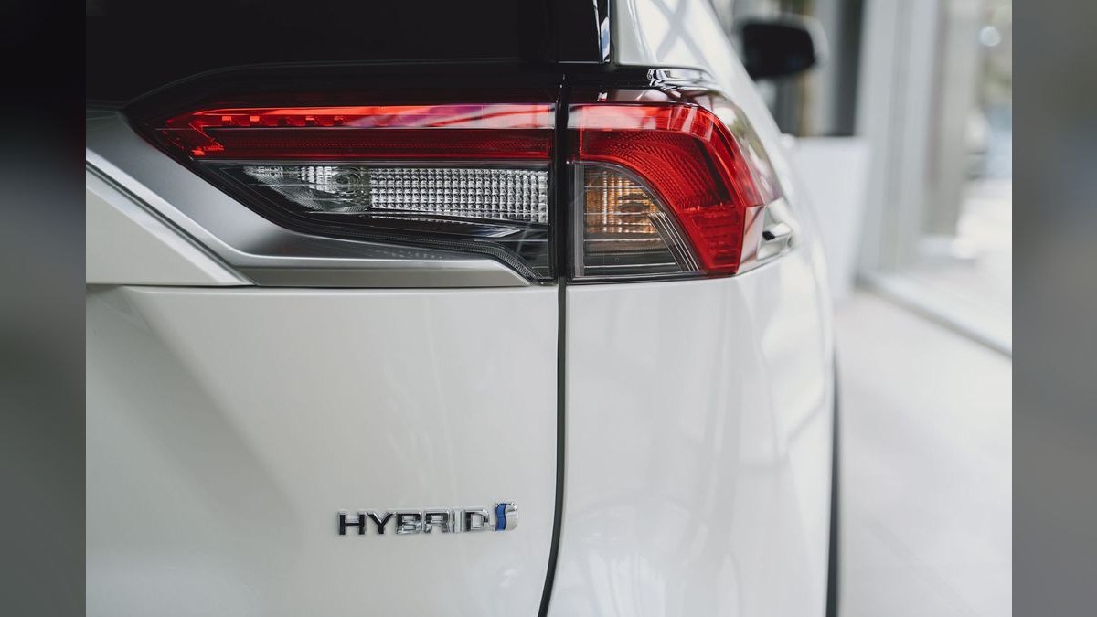 What are the most reliable used hybrid SUVs under $35,000 available in the Pacific Northwest for 2027, considering hilly terrain and frequent rain?