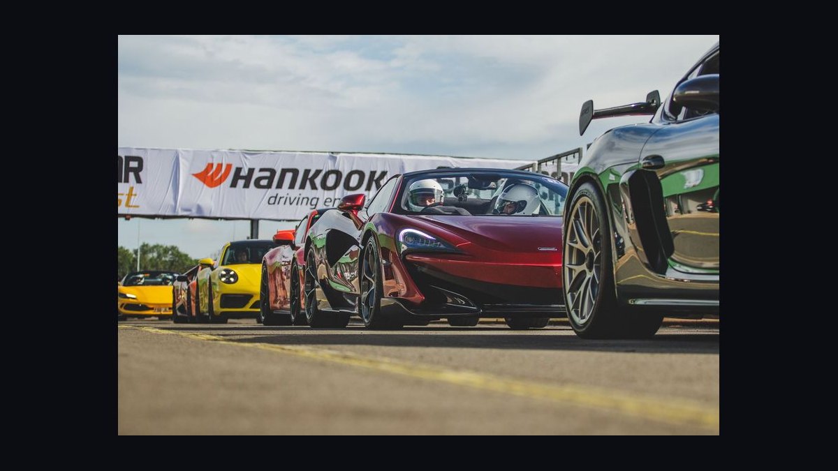 What's the difference between a grand tourer and a sports car when choosing one to drive across states in 2027 — figure 10