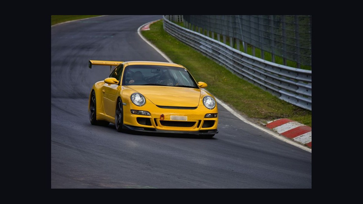 What's the difference between a grand tourer and a sports car when choosing one to drive across states in 2027 — figure 8