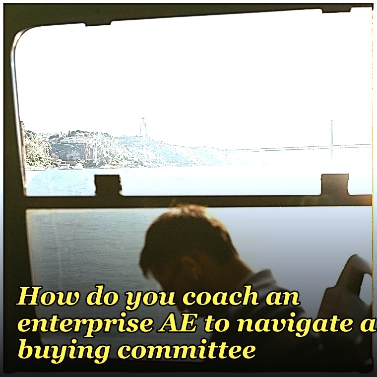 How do you coach an enterprise AE to navigate a buying committee?