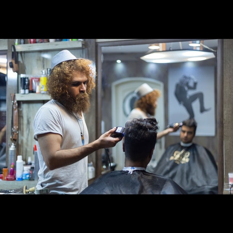 How do you build the GTM playbook for a barbershop and men's grooming chain in 2027?