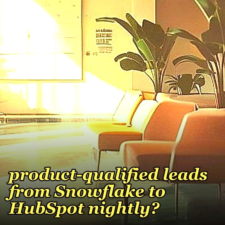 How do you sync product-qualified leads from Snowflake to HubSpot nightly?