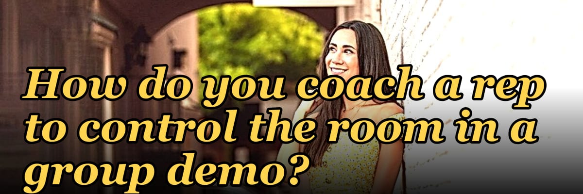 How do you coach a rep to control the room in a group demo?