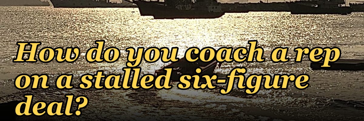 How do you coach a rep on a stalled six-figure deal?