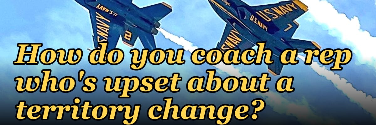 How do you coach a rep who's upset about a territory change?
