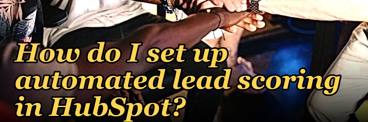 How do I set up automated lead scoring in HubSpot?