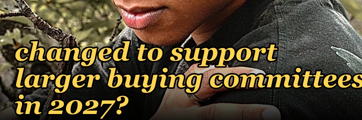 How have buyer enablement programs changed to support larger buying committees in 2027?