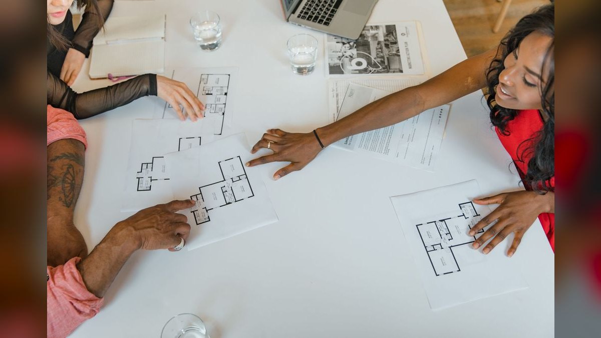 How do we transition comp plans when we move from transactional (AE closes everything) to land-and-expand (AE closes, CSM expands)?