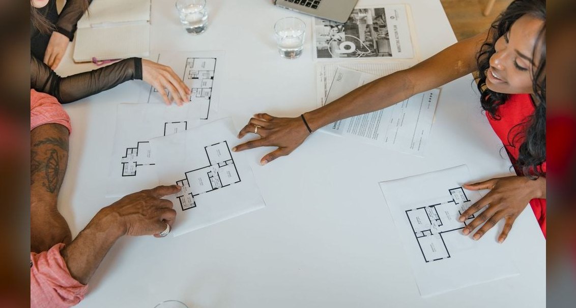 How do we transition comp plans when we move from transactional (AE closes everything) to land-and-expand (AE closes, CS