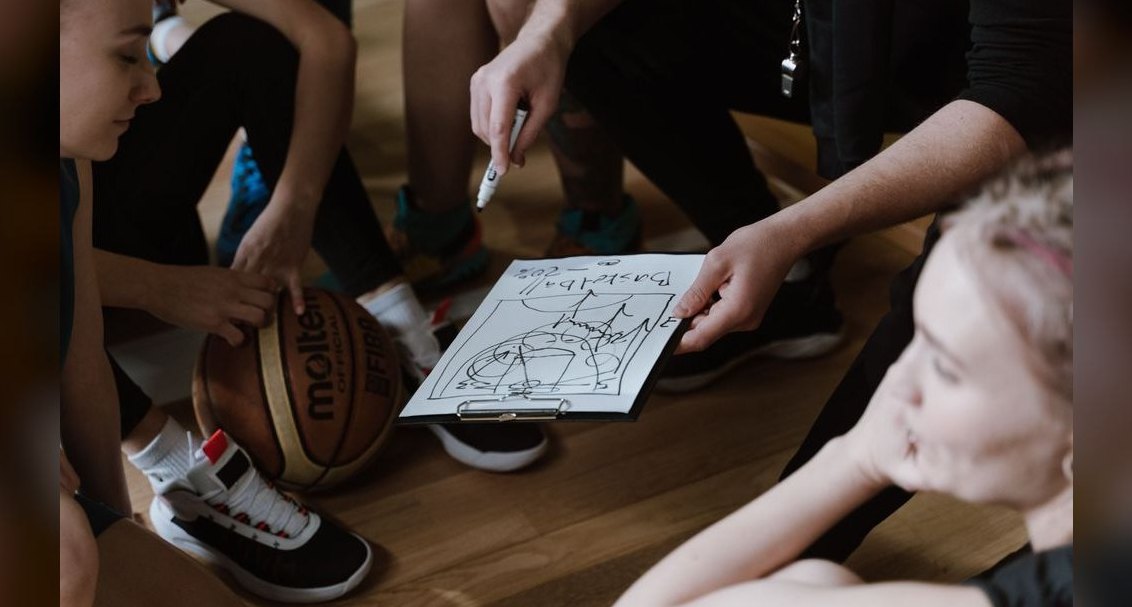 What sales team specialization model works best for federal-focused SaaS vendors?