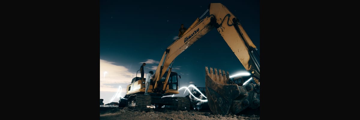 How do you architect revenue for a Heavy Equipment Dealer (Caterpillar / John Deere / Komatsu) business in 2027?