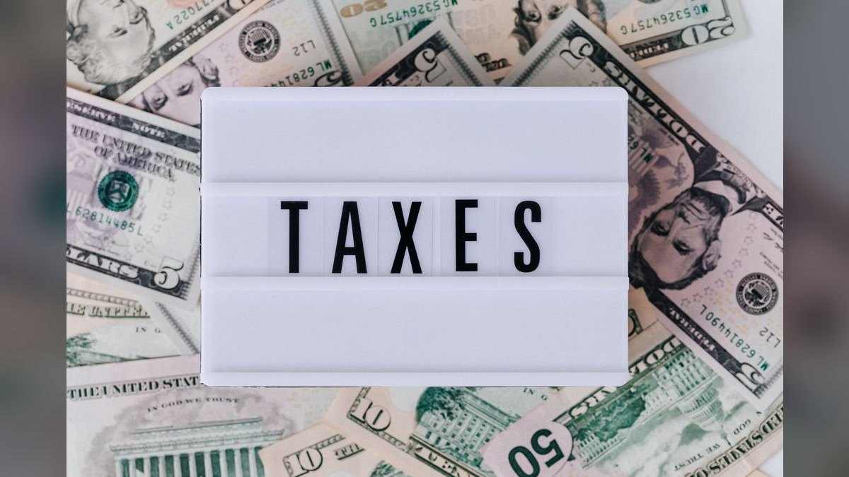 Why are taxes and fees so high on my phone bill in 2027?